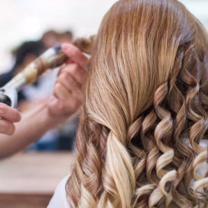 woman-hairdresser-making-hairstyle-beauty-salon_1122-6538